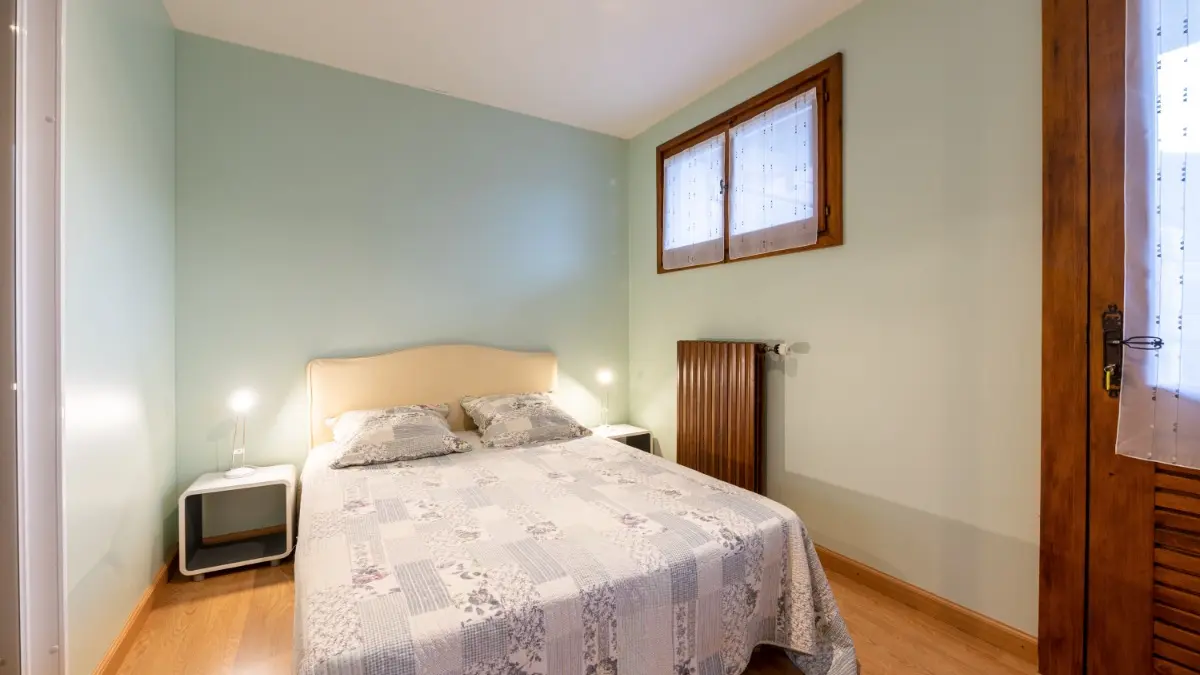 Appartement le Valserine - Chambre avec un lit double