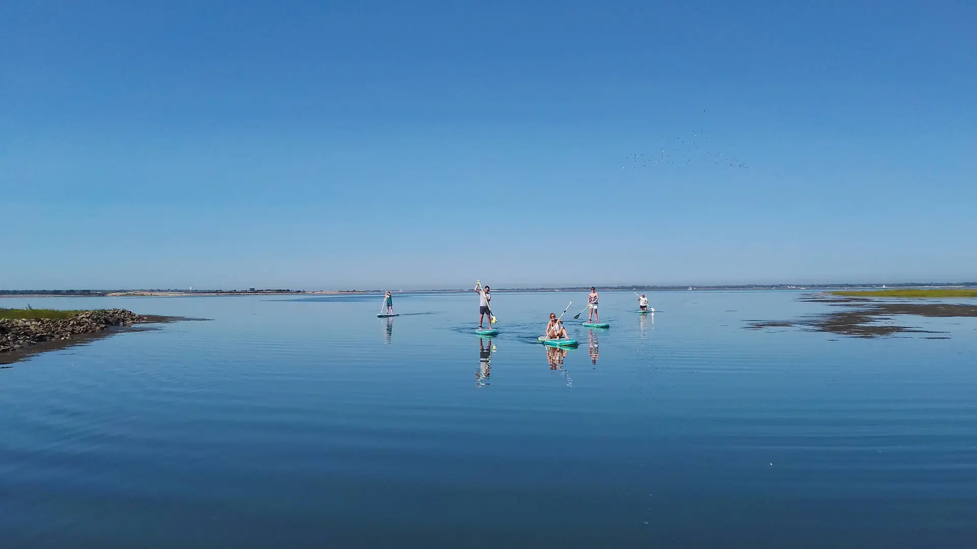 Stand-up paddleboarding on the Fier d'Ars river
