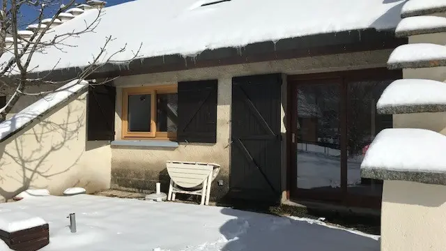 maison sous la neige