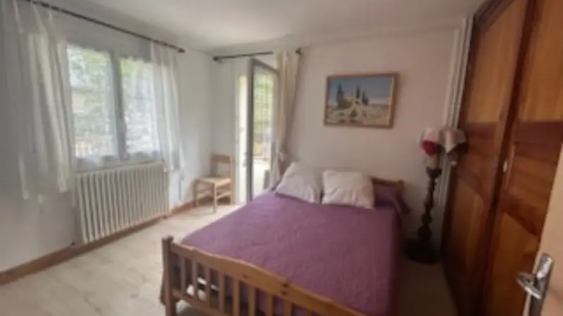 Bright bedroom with double bed