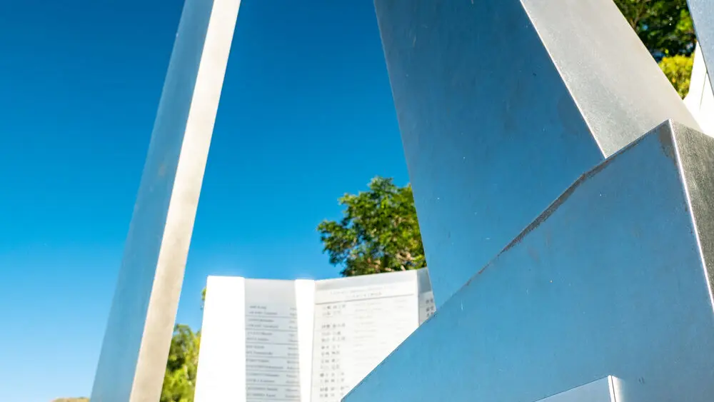 Modern memorial containing the list of Japanese