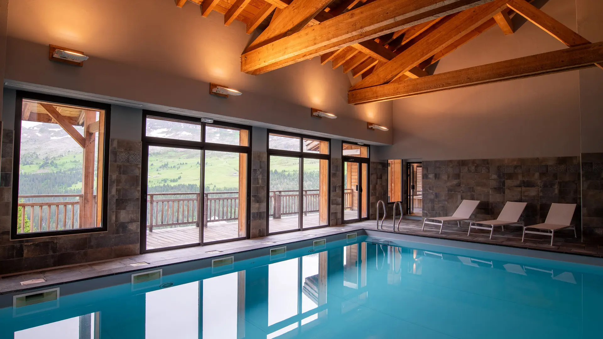 The indoor swimming pool with mountains view