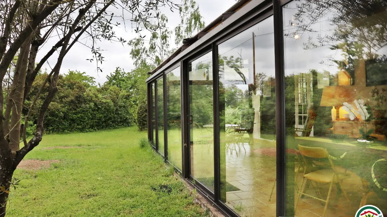 Véranda jardin d'hiver exposée plein sud