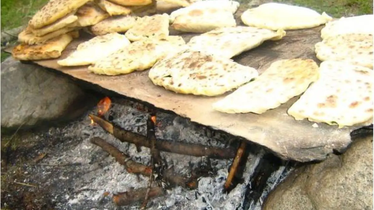 Cuisson à la ciappe des tourtons aux herbes sauvages