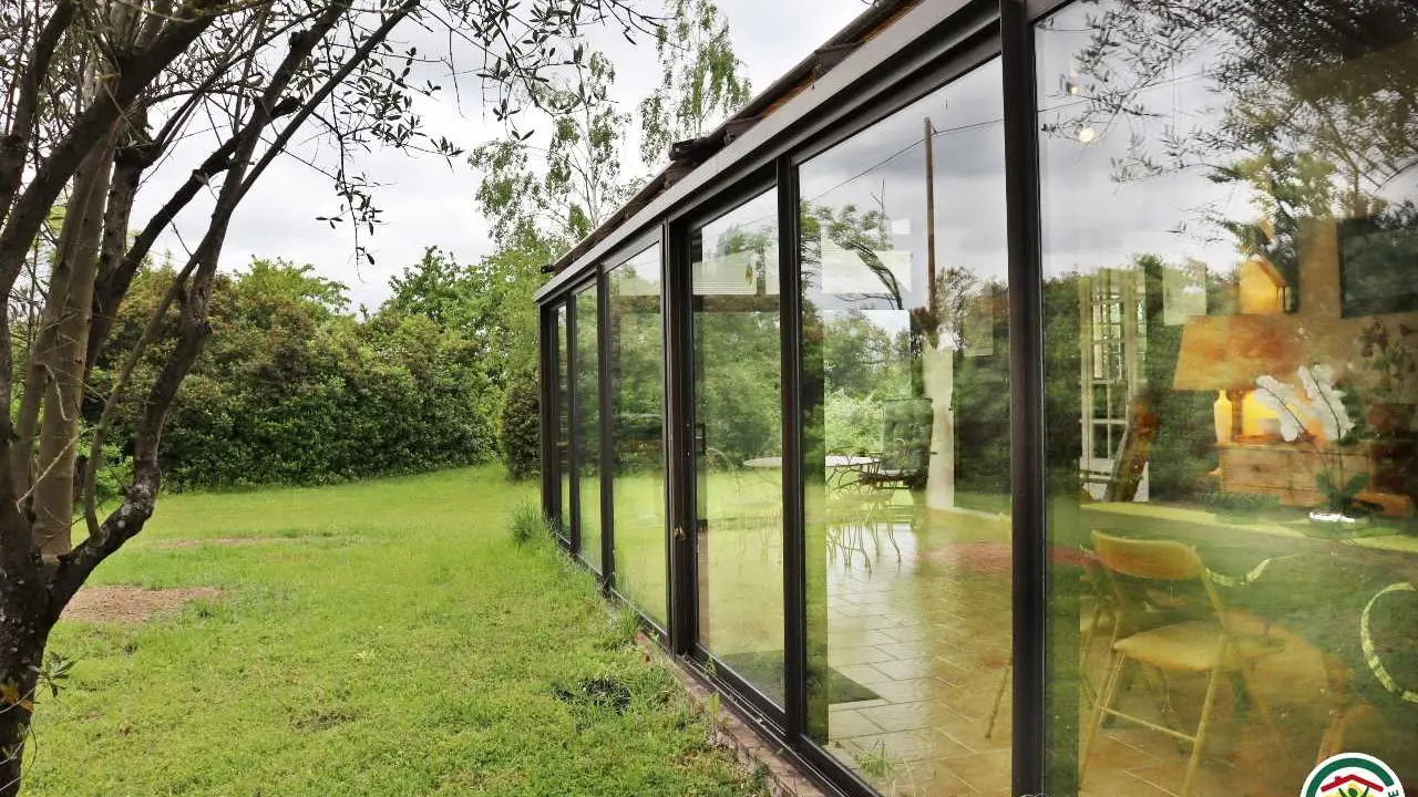 Véranda jardin d'hiver exposée plein sud