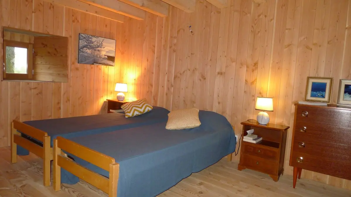 Chambre RDC PMR jouxtant salon