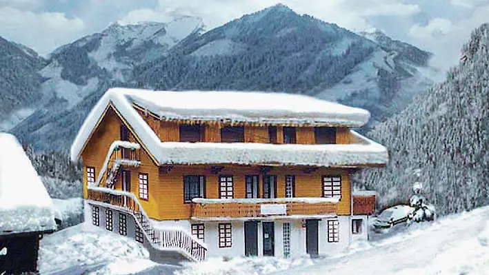 Le chalet la Colline aux Oiseaux en hiver