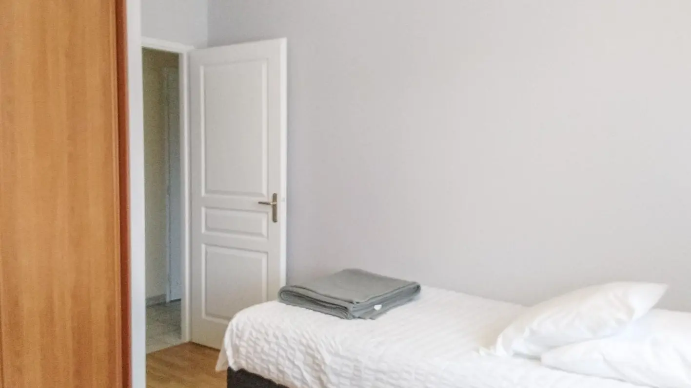 Chambre 2 en configuration lits séparés