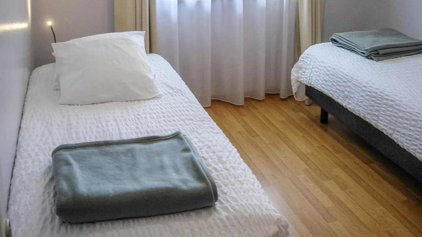 Chambre 2 en configuration lits séparés
