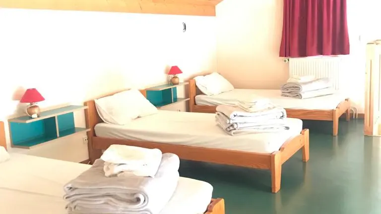 Mezzanine avec couchages à l'étage dans location de vacances à Thônes