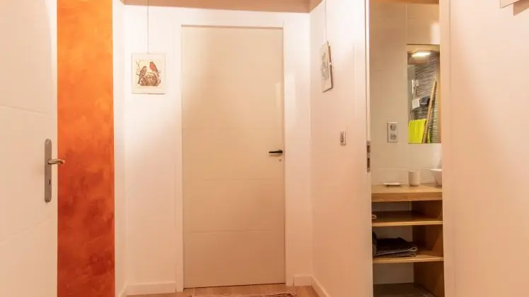 Dégagement à l'étage avec salle d'eau et chambres