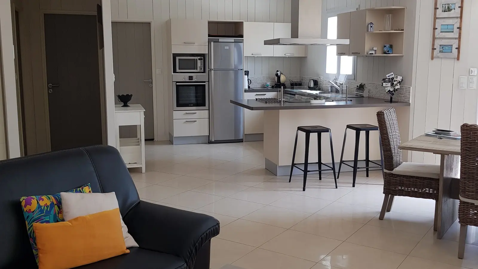Living room with kitchen at the back