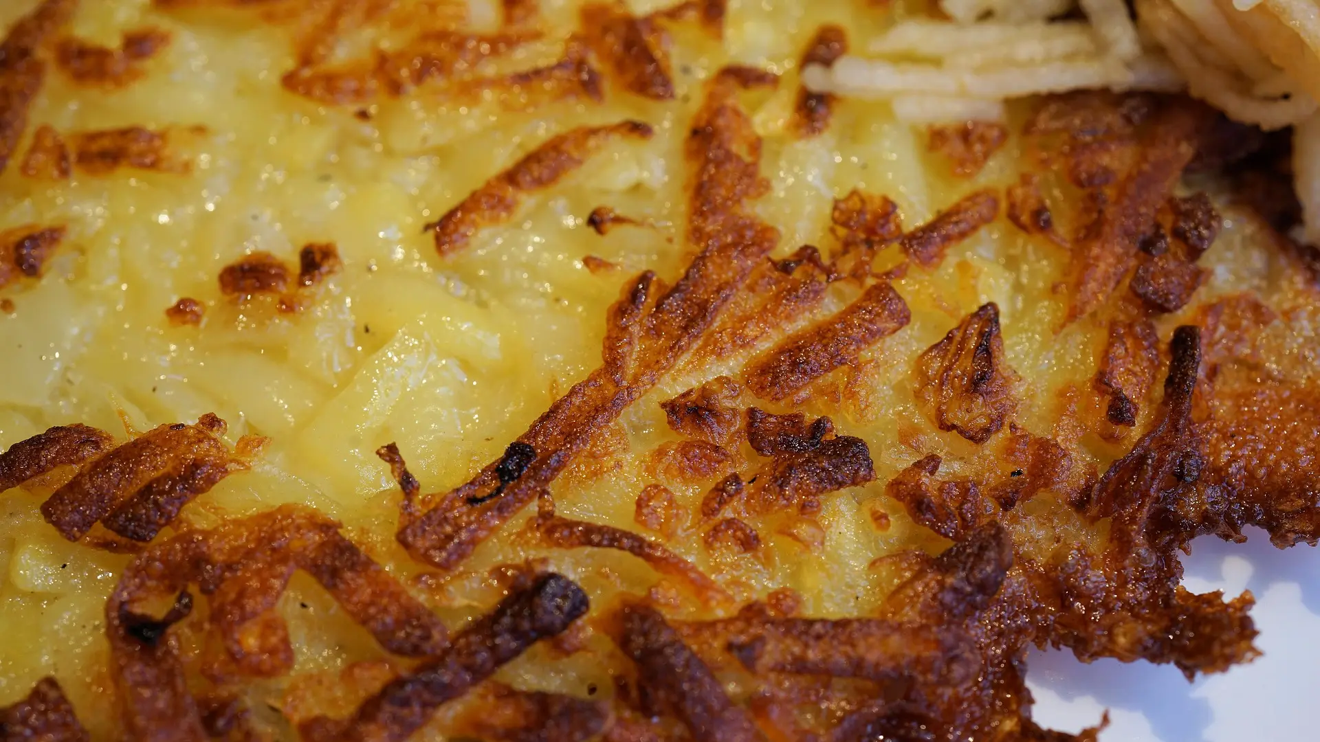 Prendre le temps de déguster une rappée de pommes de terre faite maison