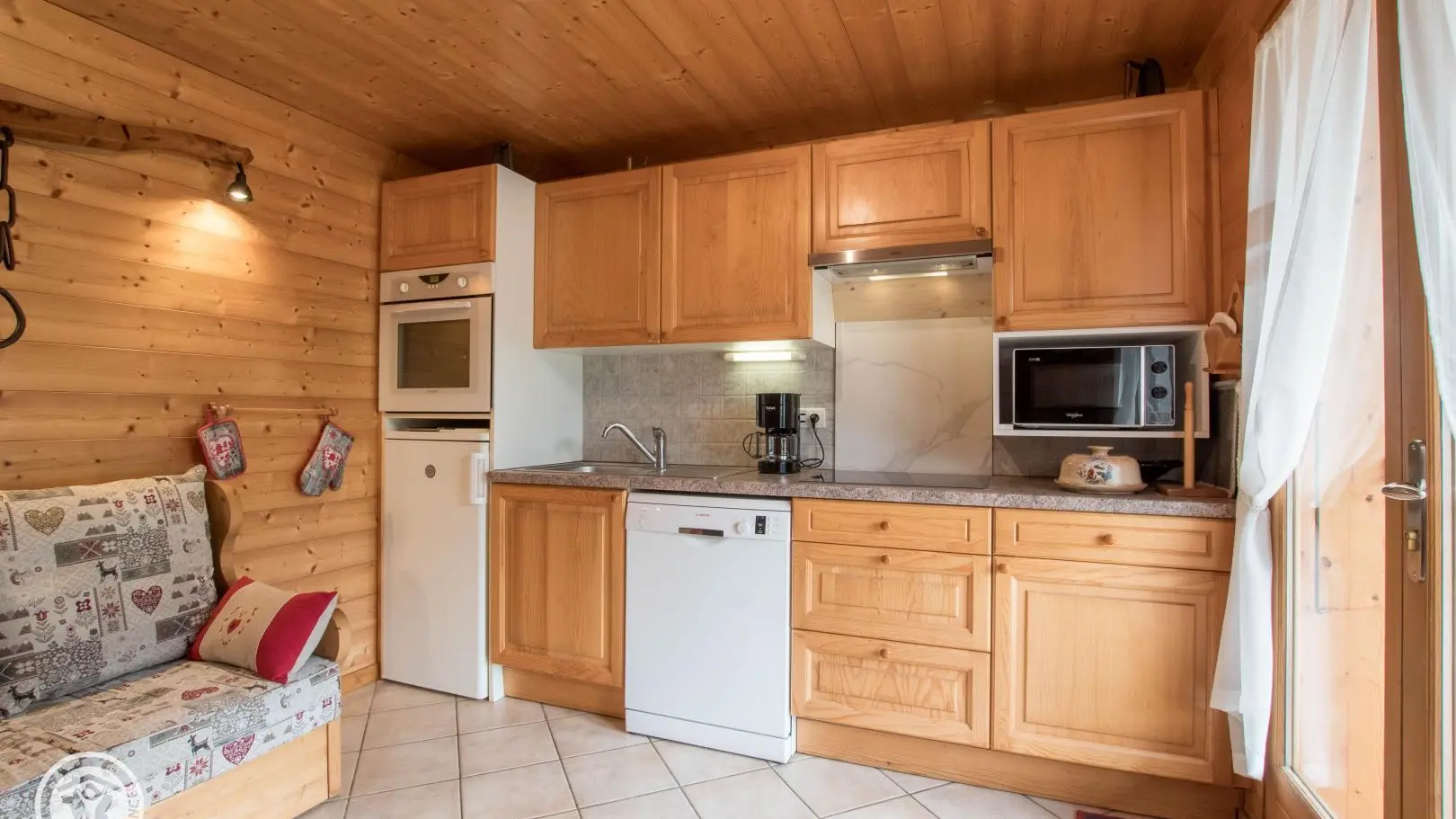 Le séjour / cuisine vue 2/5