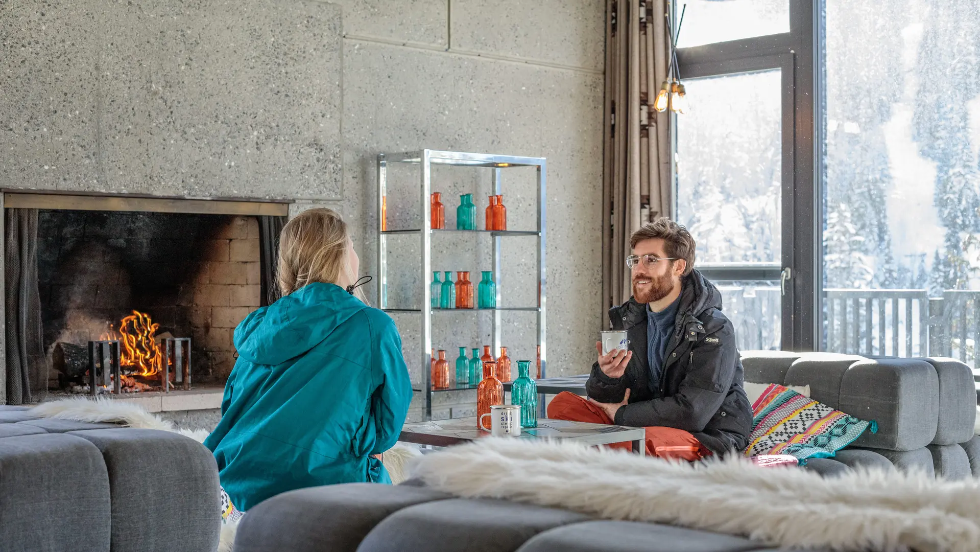 Drinks with friends by the fireplace