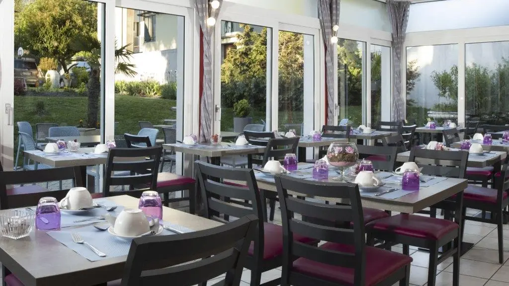Hôtel de France - salle de petit-déjeuner