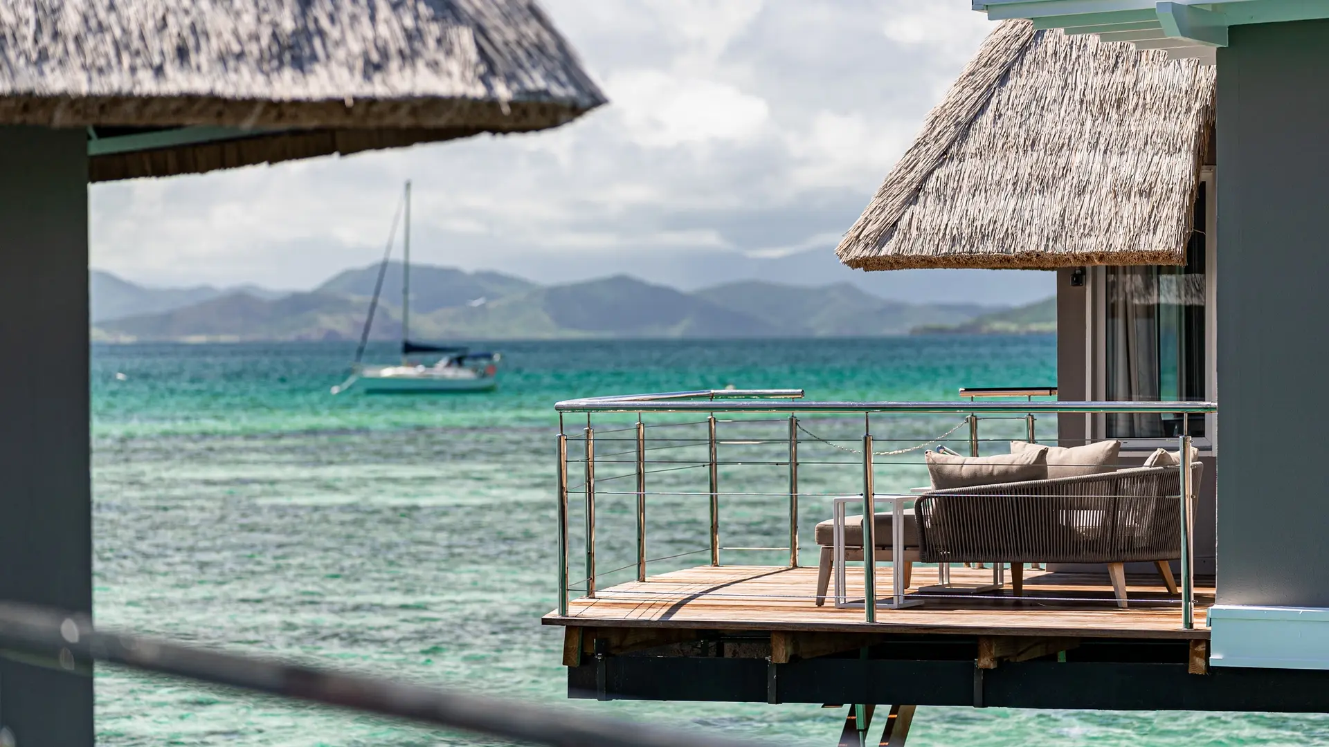 Terrace of overwater bungalows -  DoubleTree by Hilton