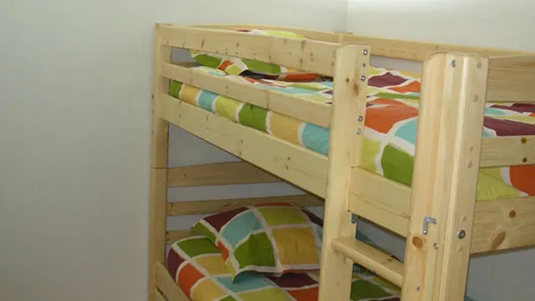 Children's bedroom with bunk beds, parquet flooring