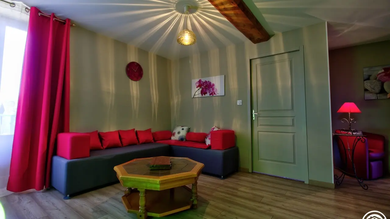 L'espace détente à l'étage avec accès au balcon