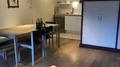 Séjour avec salle à manger et cuisine