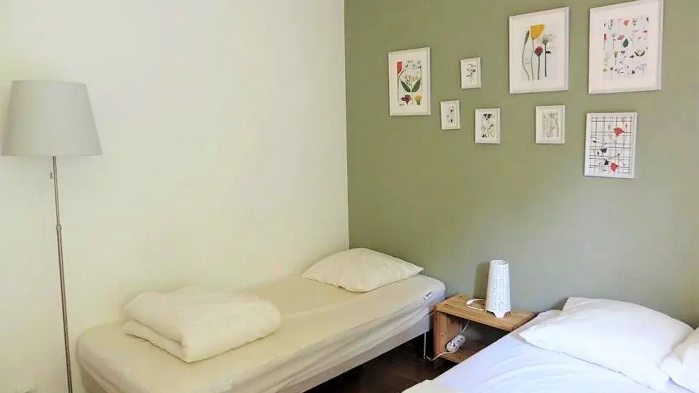 Chambre avec lit double et lit simple