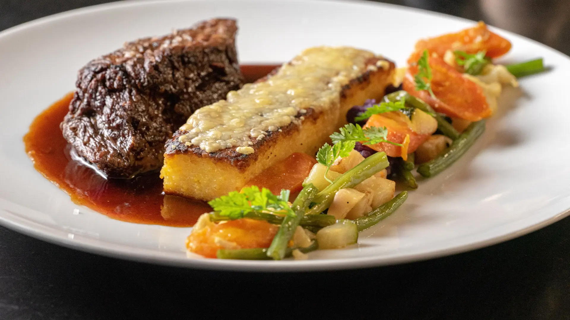Restaurant Le Toî du Monde - Plat Pièce de bœuf et frite de polenta