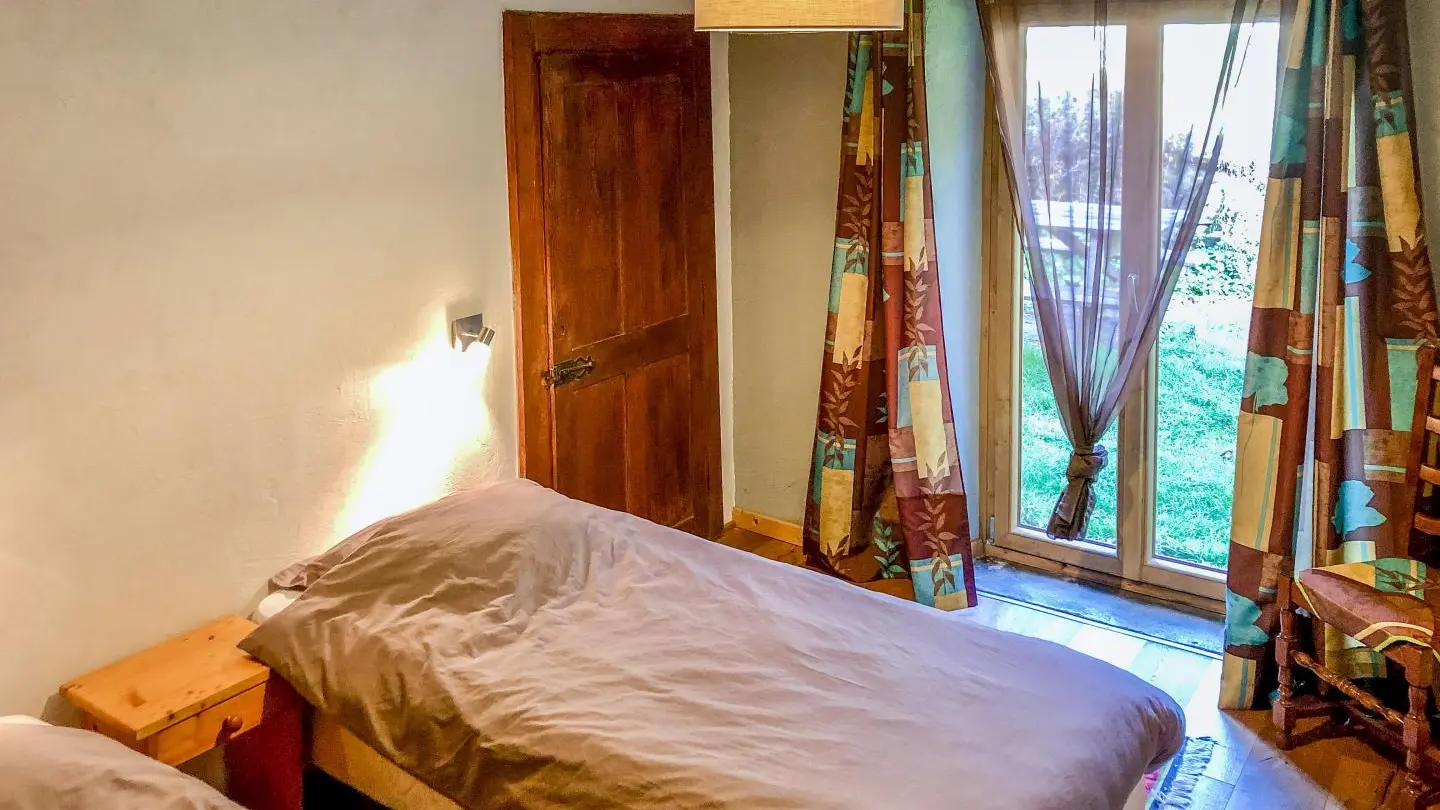 Chambre 1 (configuration avec 2 lits séparés)