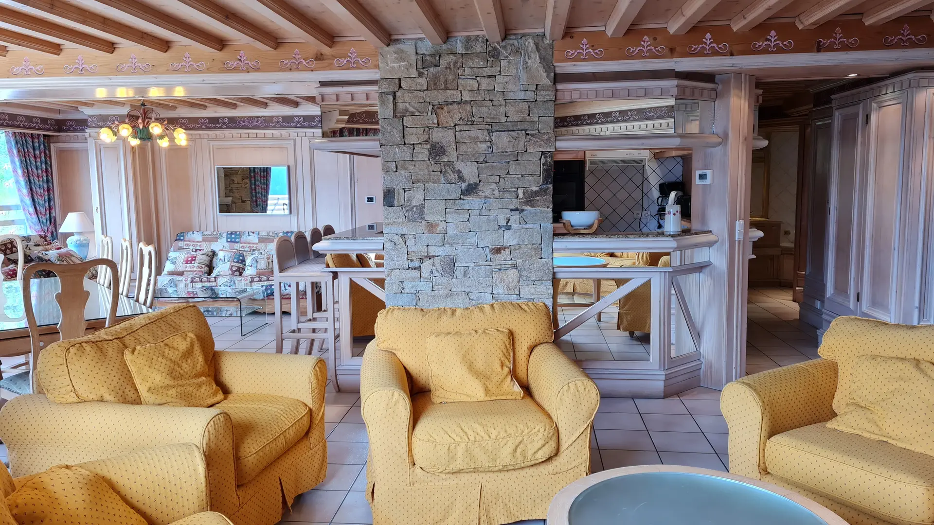 Living room with kitchen in background