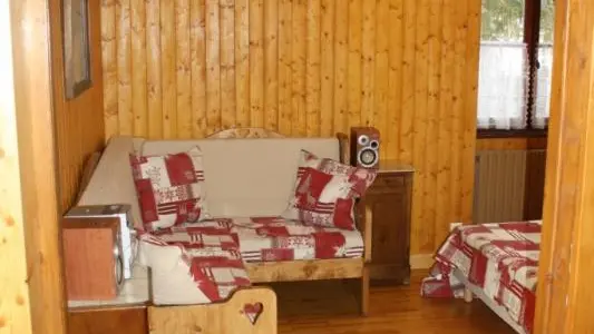 L'entrée dans le coin salon / chambre