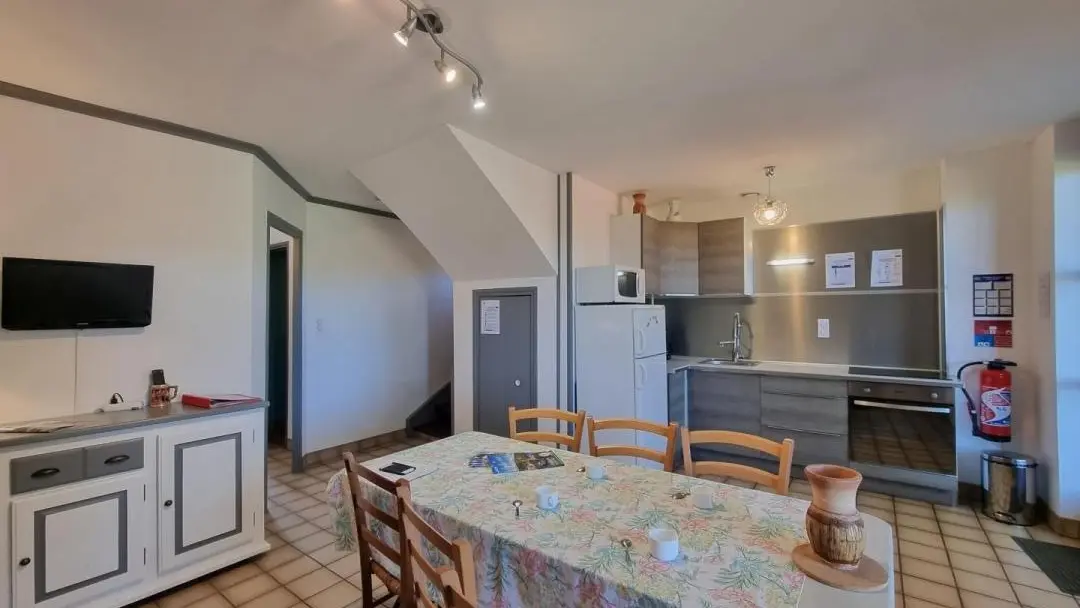 1er niveau : cuisine ouverte sur l?espace repas & détente.