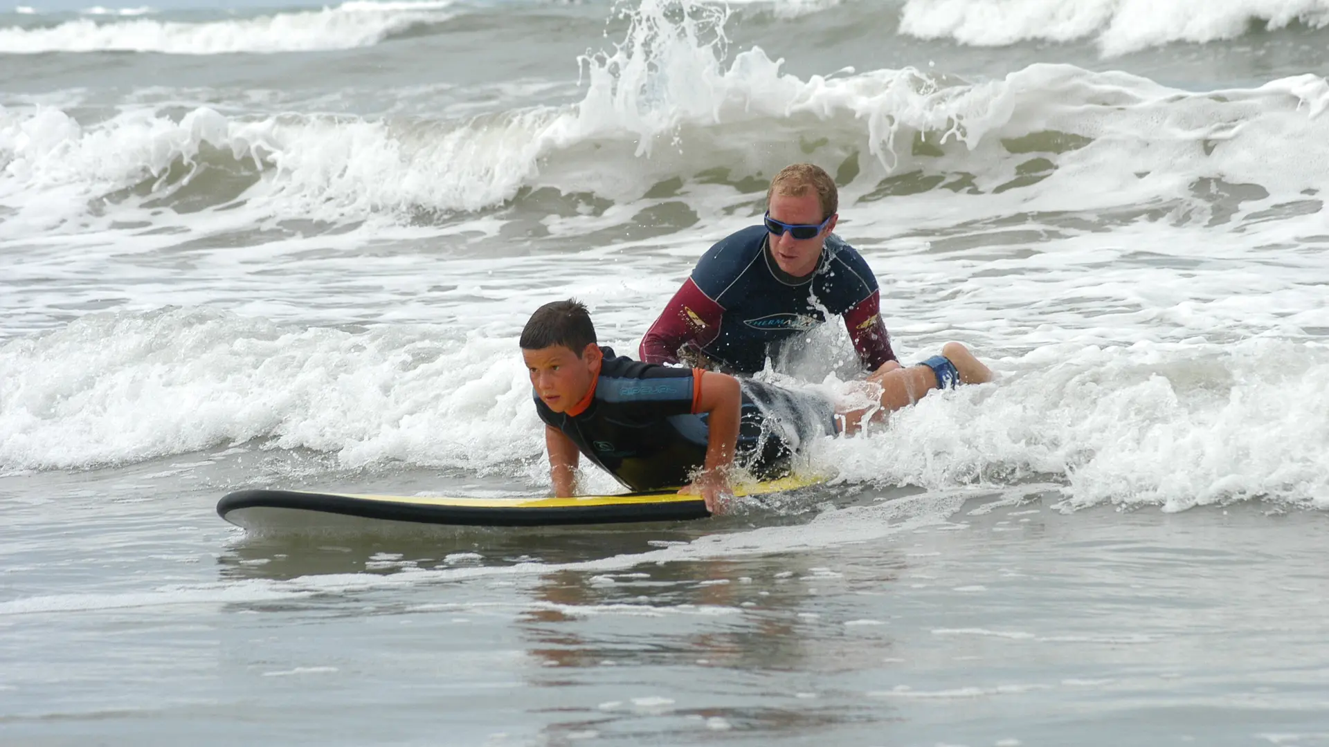 Cours de surf et natation