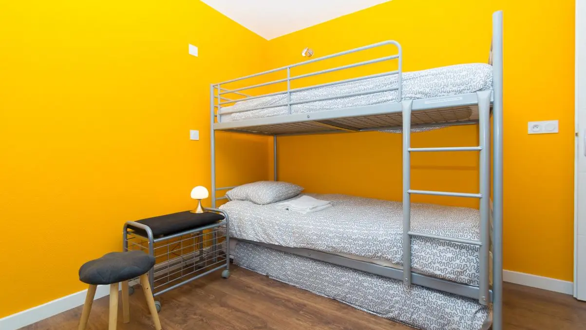 Chambre jaune lits superposés 90 x200