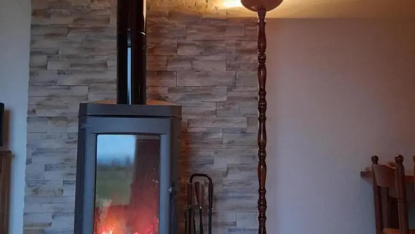 la chaleur du poêle à bois