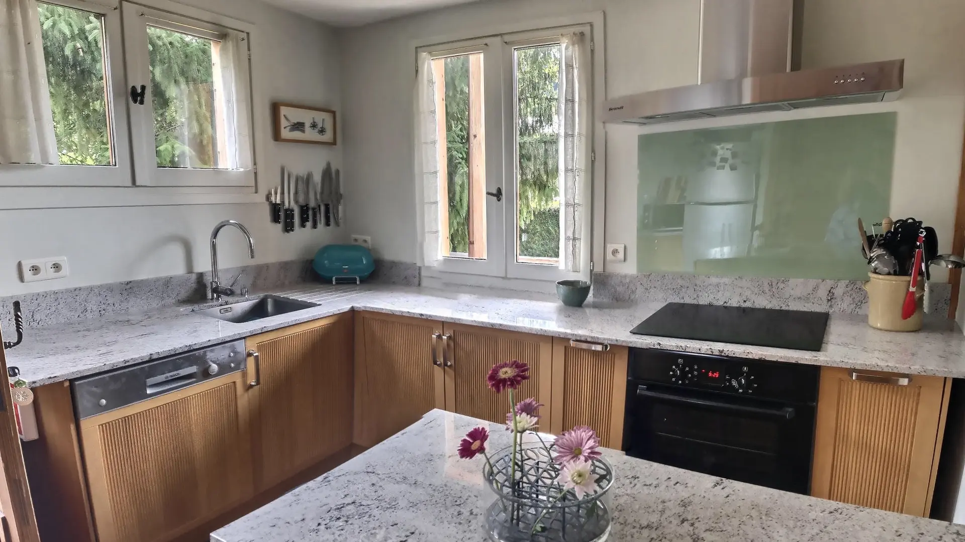 Spacious well equipped kitchen with granite worktops