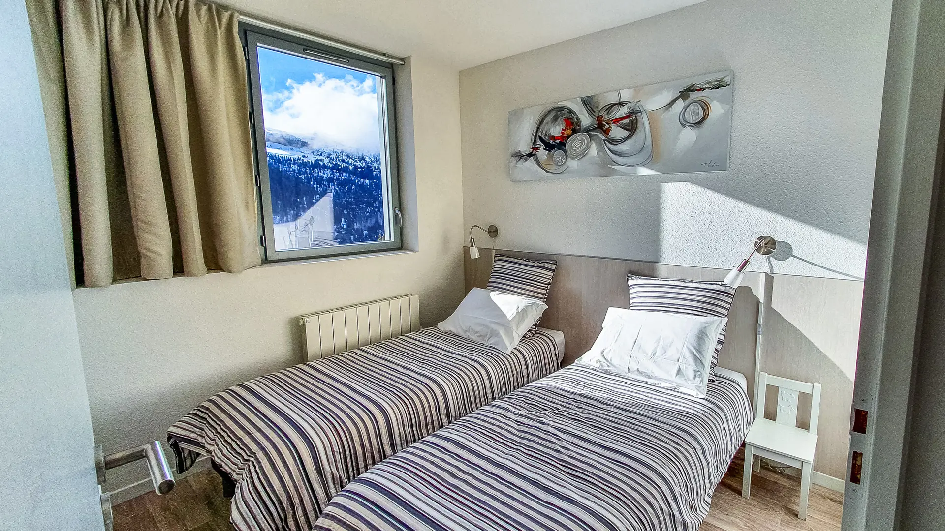 Chambre N°1 avec deux lits simples convertibles en double