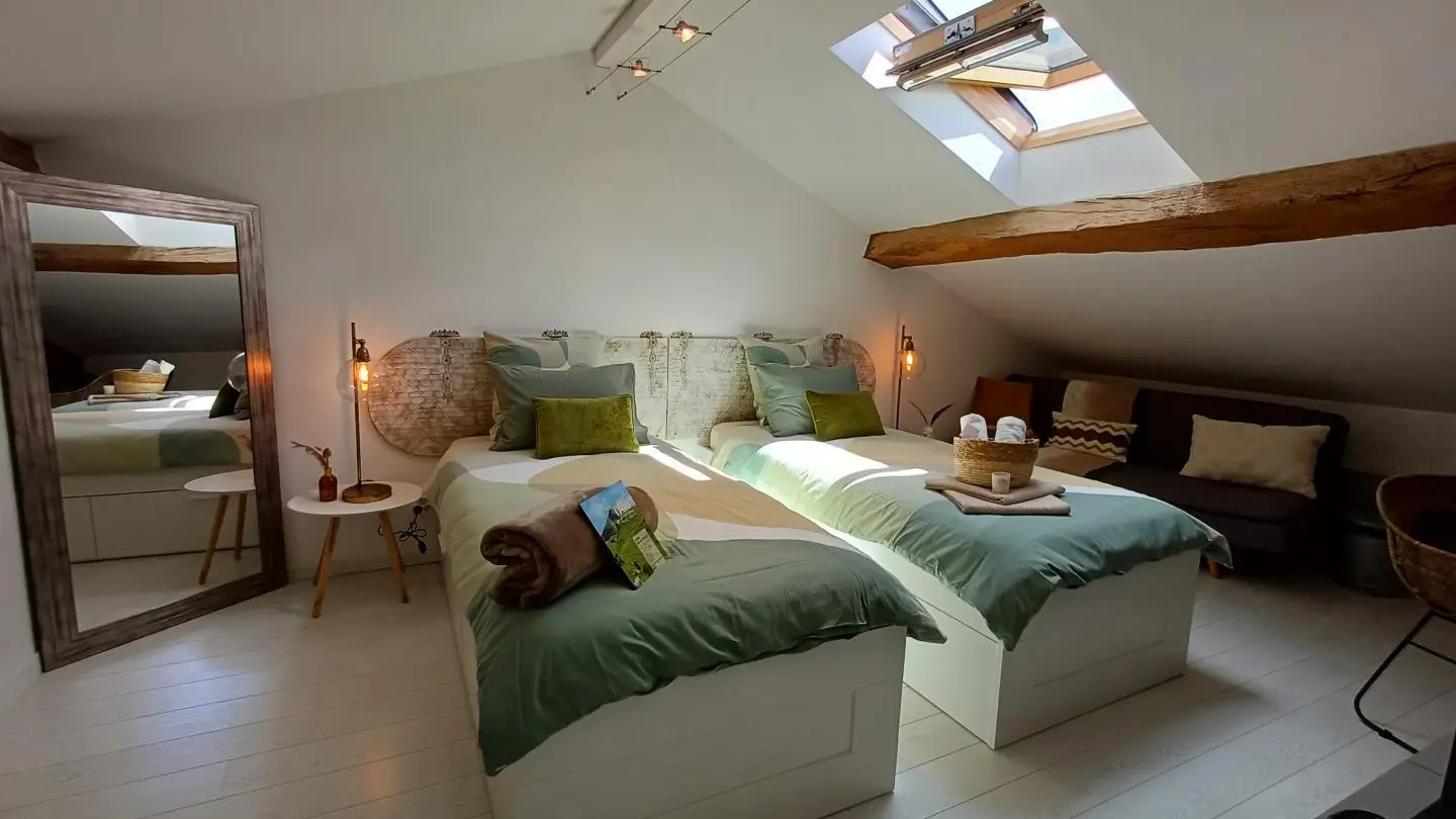 Chambre mansardée modulable en 2 lits simples