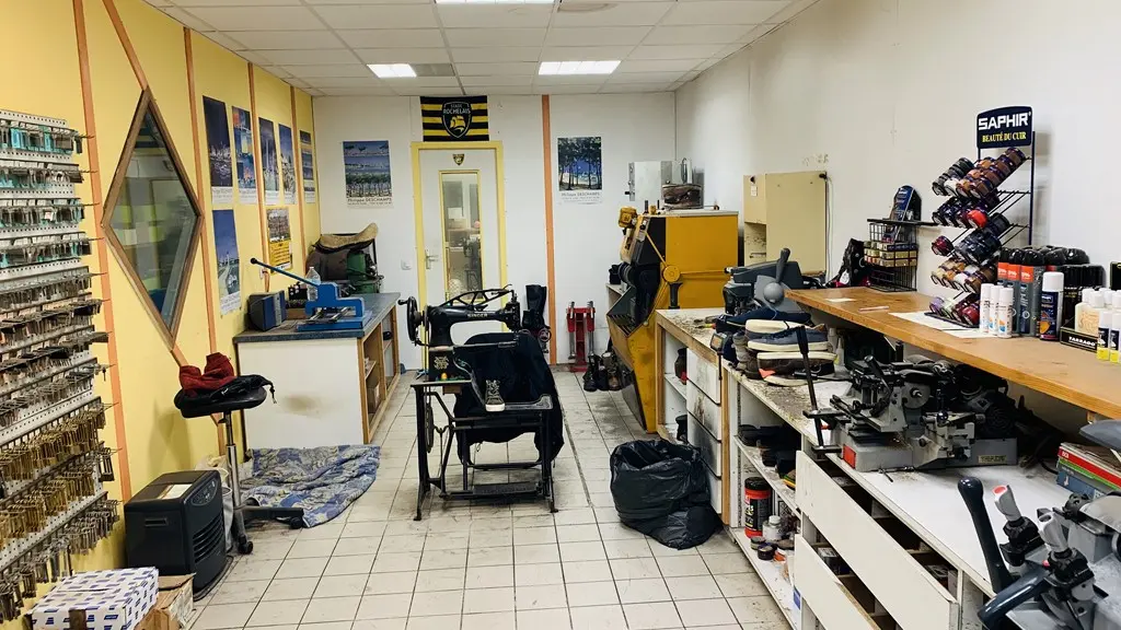 Schuhmacher und Schlüssel