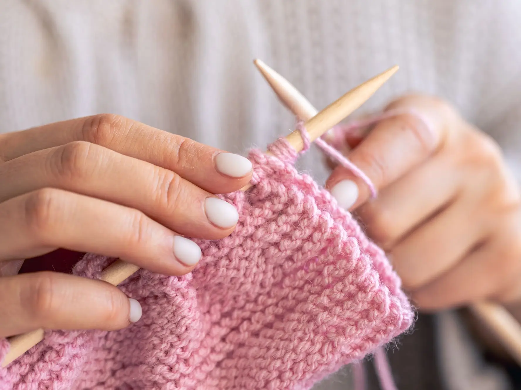 closeup-hands-knitting-using-circular-needles