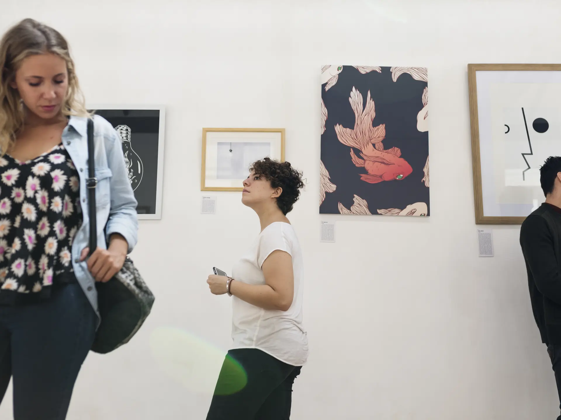 People attending an art exhibition