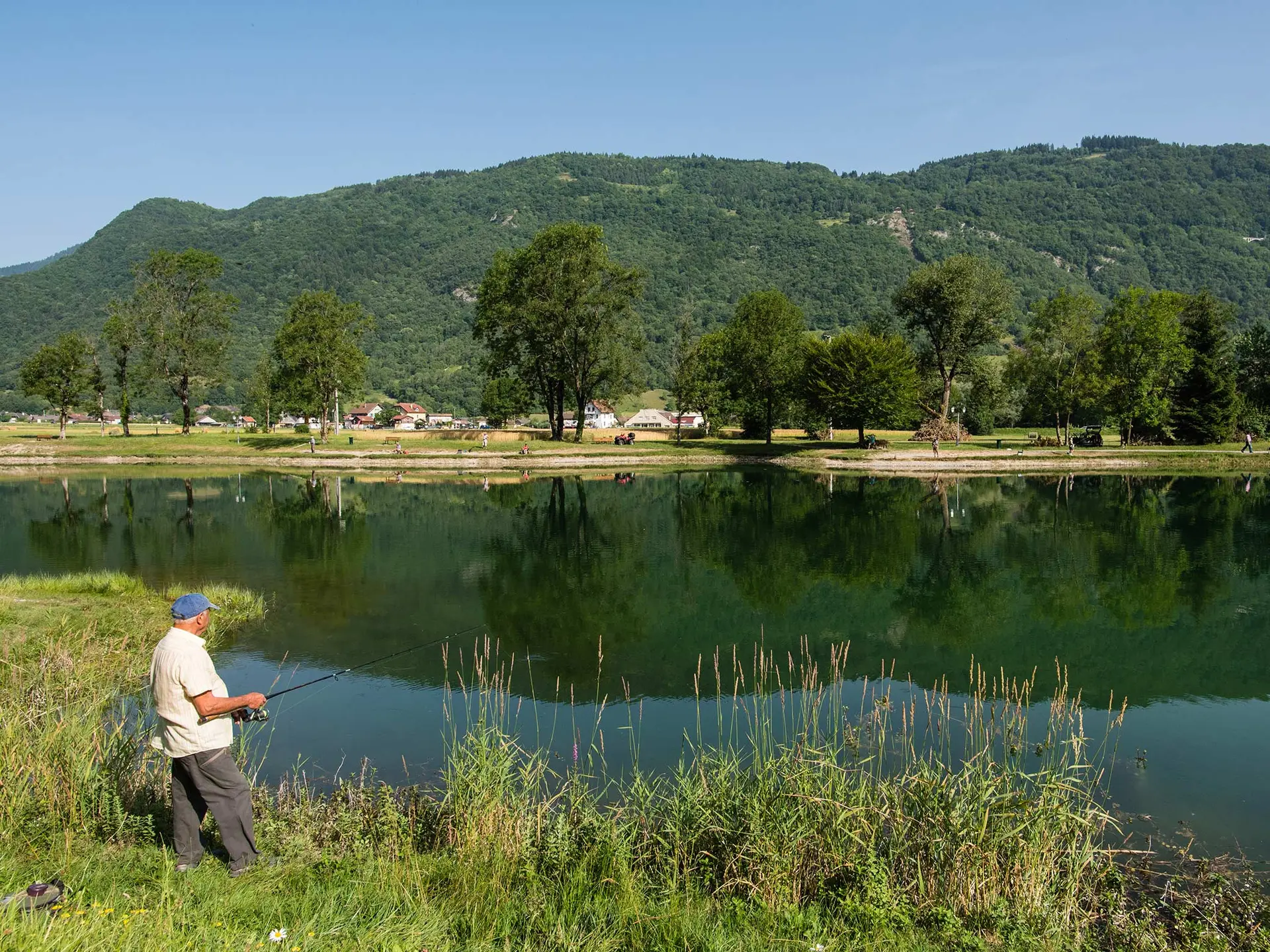 Marlens pond and fisherman