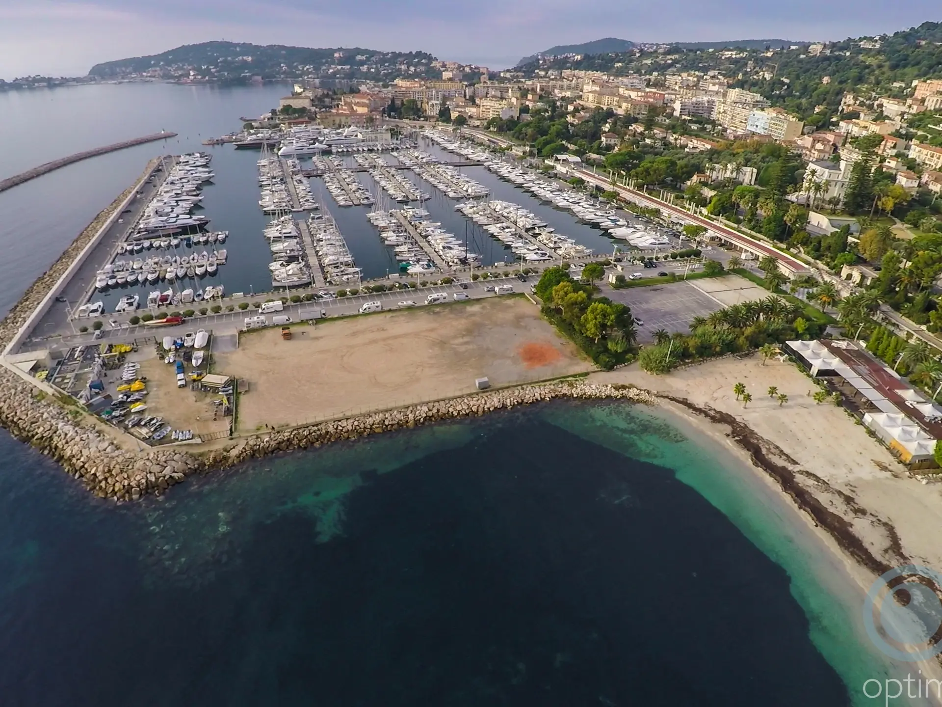 Port, carpark and Petite Afrique beach Beaulieu-sur-Mer