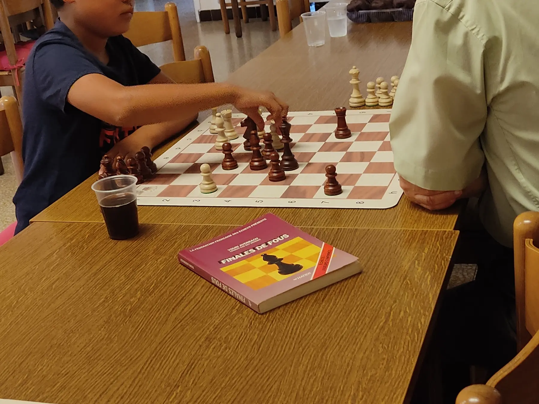 Enzo, jeune joueur de 10 ans et Grégoire Daoud.