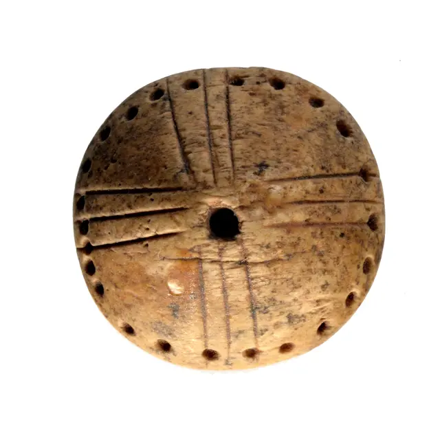 POI 3- Bouton conique en os_dolmen Pech_Alvignac.jpg