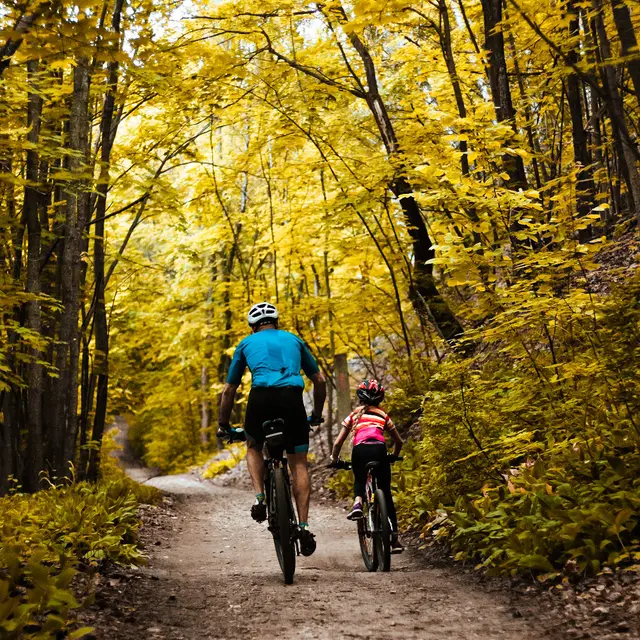 father-daughter-bike-ride-warm-early-autumn-weekend