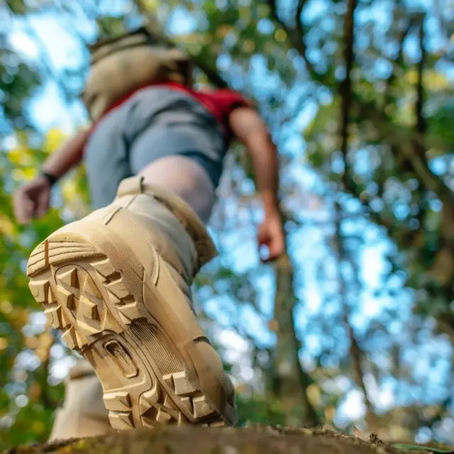 Close up shoes of Hiker walking in the forest Trail
