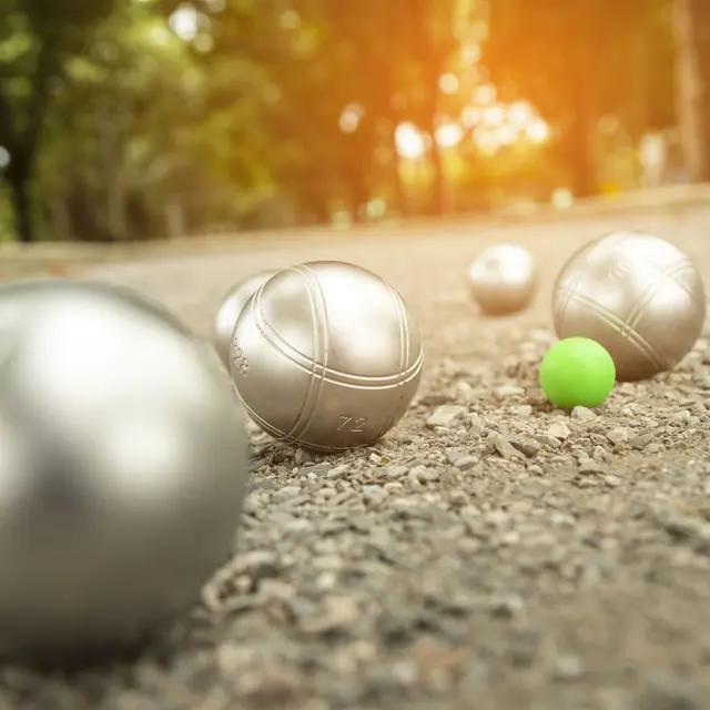 Petanque balls in the playing field.