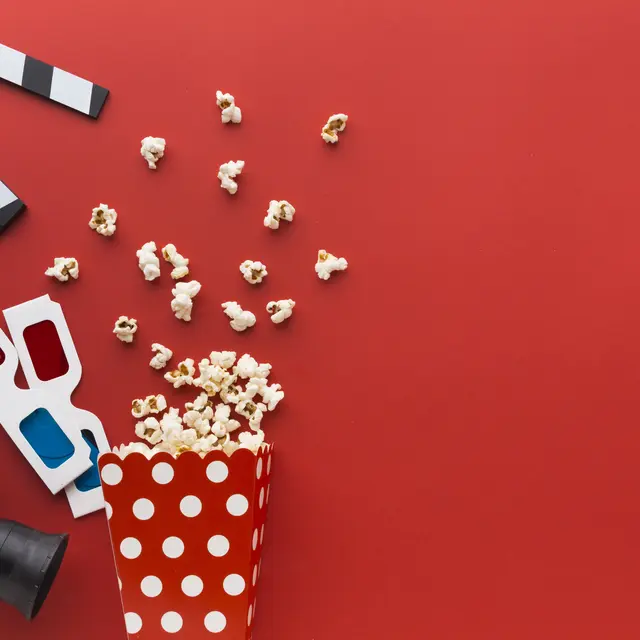 cinema-elements-on-red-background-with-copy-space