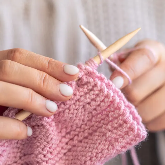 closeup-hands-knitting-using-circular-needles