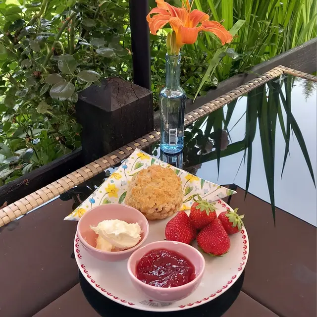 scones with clotted cream jam and strawberry at the tea room Spruce Lake Tea Garden