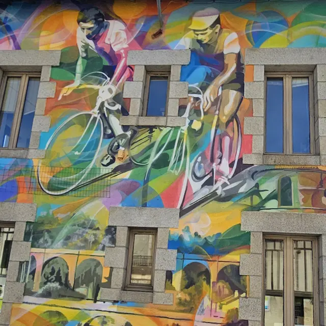 Raymond Poulidor face à Anquetil sur la fresque de Saint-Léonard de Noblat